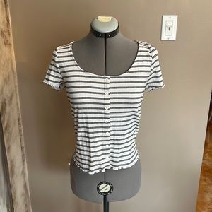 This black and white striped Forever 21 T-shirt is new and in style!